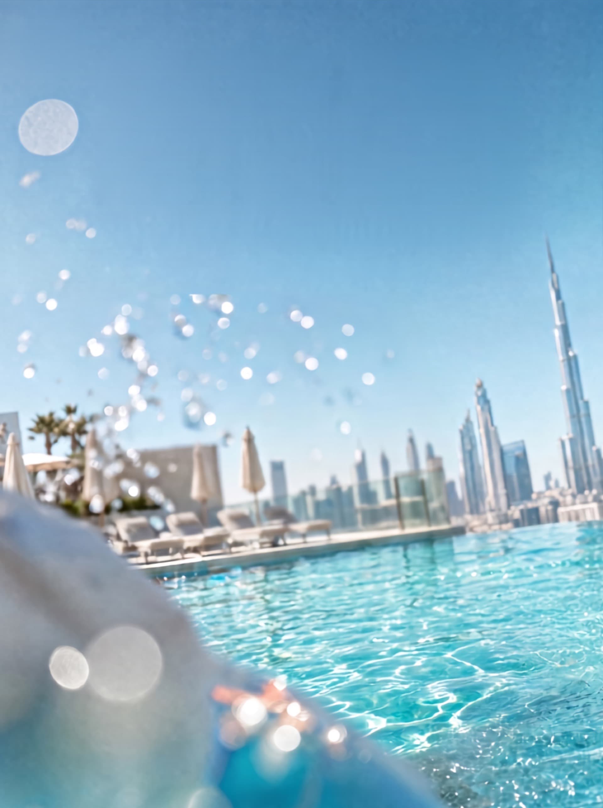 Dubai poolside with the skyline behind